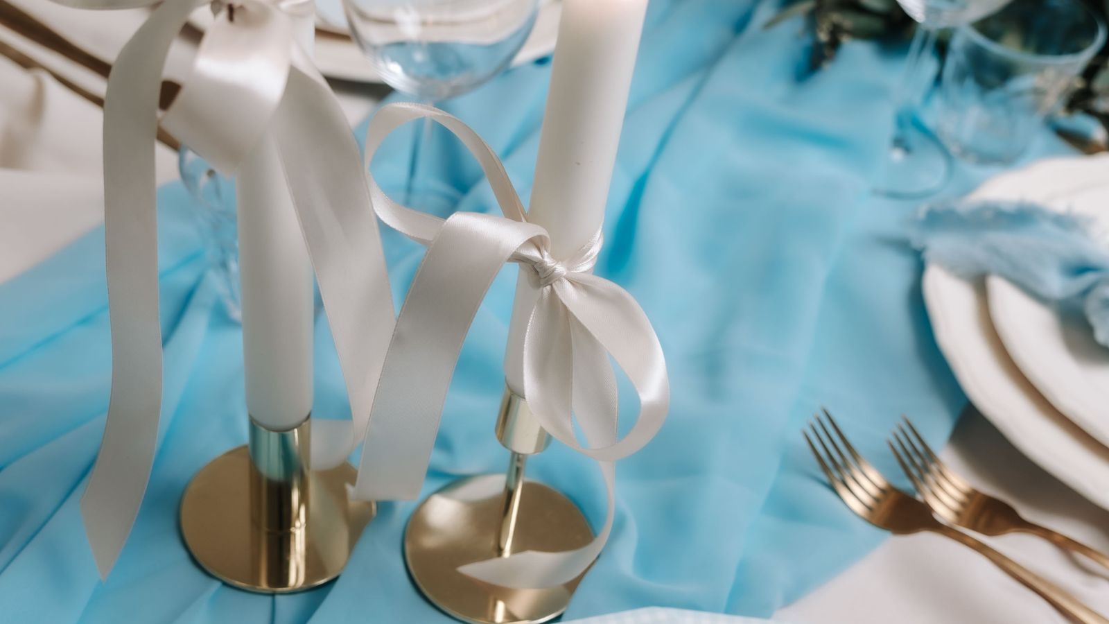 Festively set table with candles and fill-in cards by Studio Miron